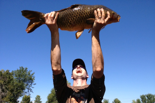 Scott Demoss hoists his carp